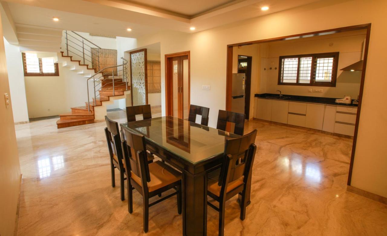 Falcon Suites Yelahanka New Town Бангалор Екстериор снимка